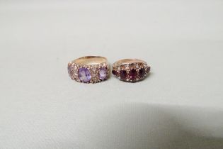 Two 9ct yellow gold rings - one with five garnets, oval cut, and sea pearls to shoulder ring size