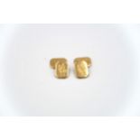 A pair of 18ct yellow gold cufflinks of rectangular form with canted corners, engraved PNR to