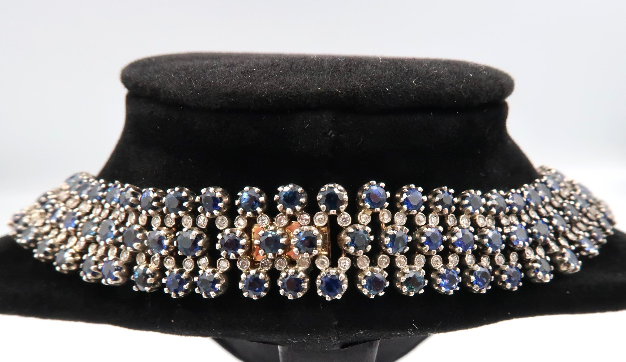 A stunning three row articulated sapphire and diamond necklace. The graduating circular claw set - Image 7 of 11