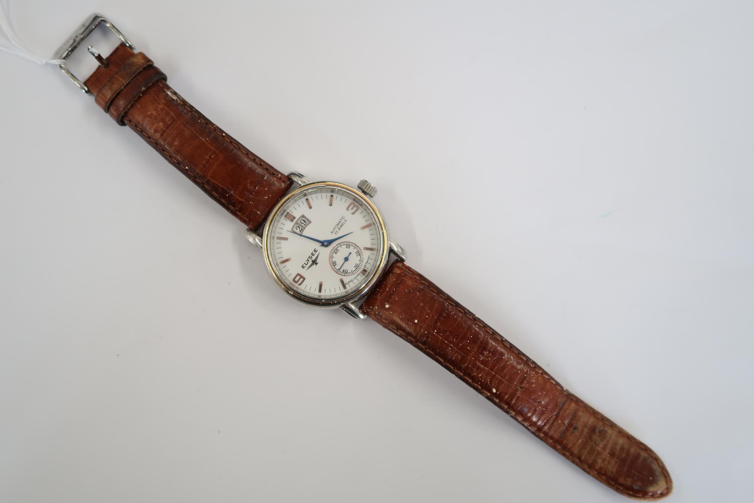 A Gents Elysee auto day/date watch on a brown leather strap, running in saleroom - Image 3 of 3