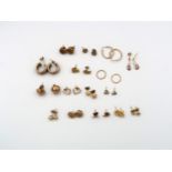 Sixteen pairs of 9ct gold earrings, total weight 14.5 grams