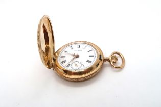 A 14ct Yellow gold cased hunter pocket watch, the white enamel dial with roman numerals and