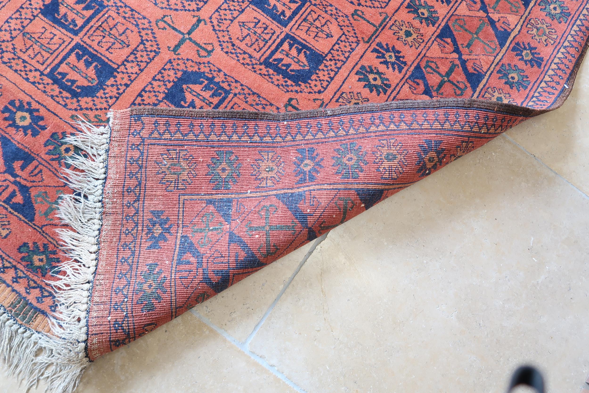 A vintage Afghan rug, 195cm x 127cm - Bild 2 aus 2