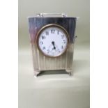 A solid silver cased clock - Birmingham 1938