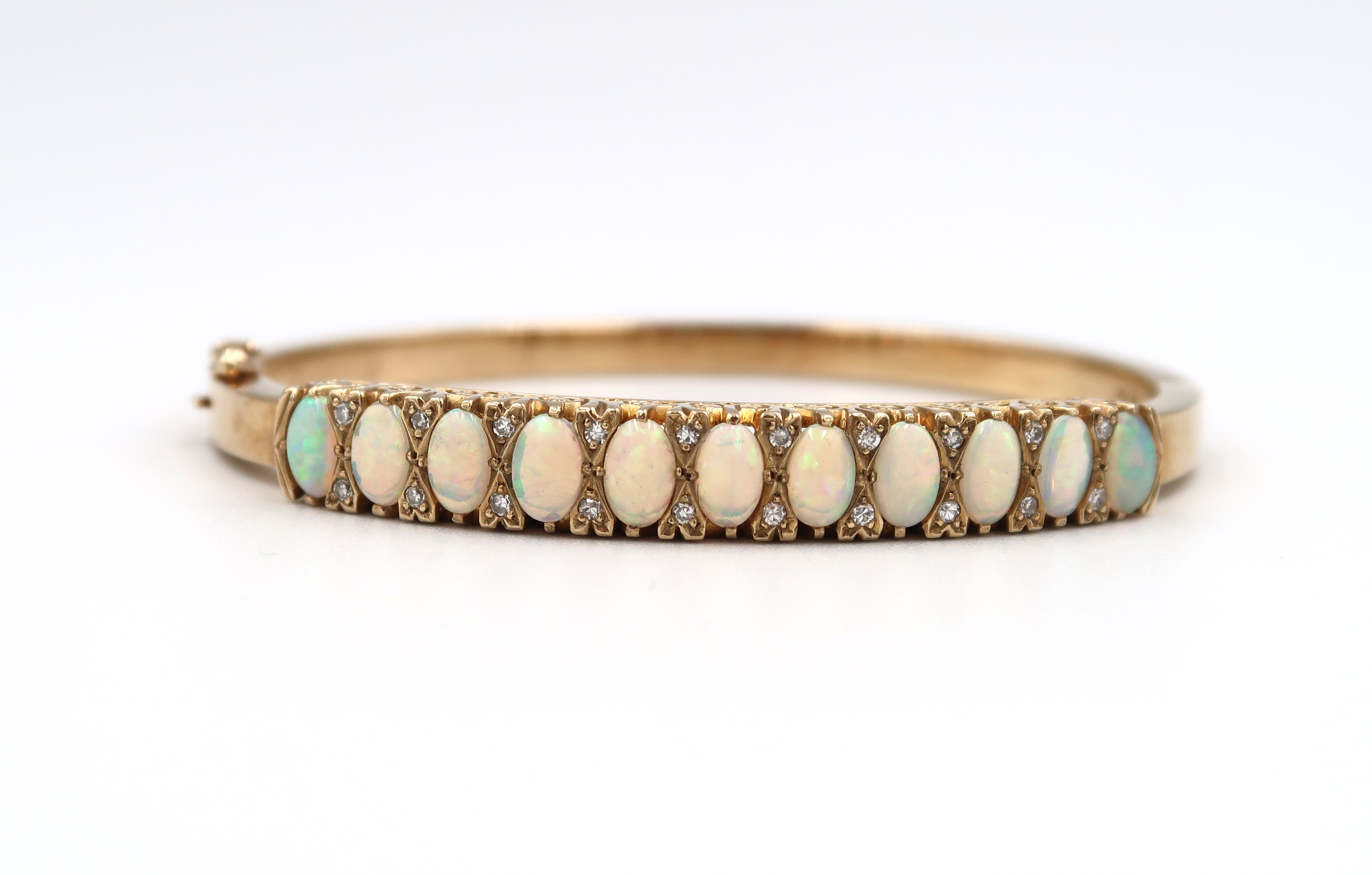 A 9ct and opal and diamond bracelet, approx 21.99 grams - Image 5 of 6