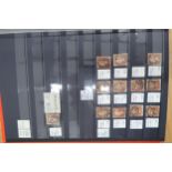 A stamp album containing British stamps of the Victorian period stamps include The Penny Black,