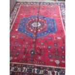 A hand knotted woollen Afshar rug - 2.23m x 1.70m
