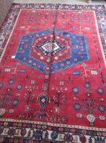 A hand knotted woollen Afshar rug - 2.23m x 1.70m