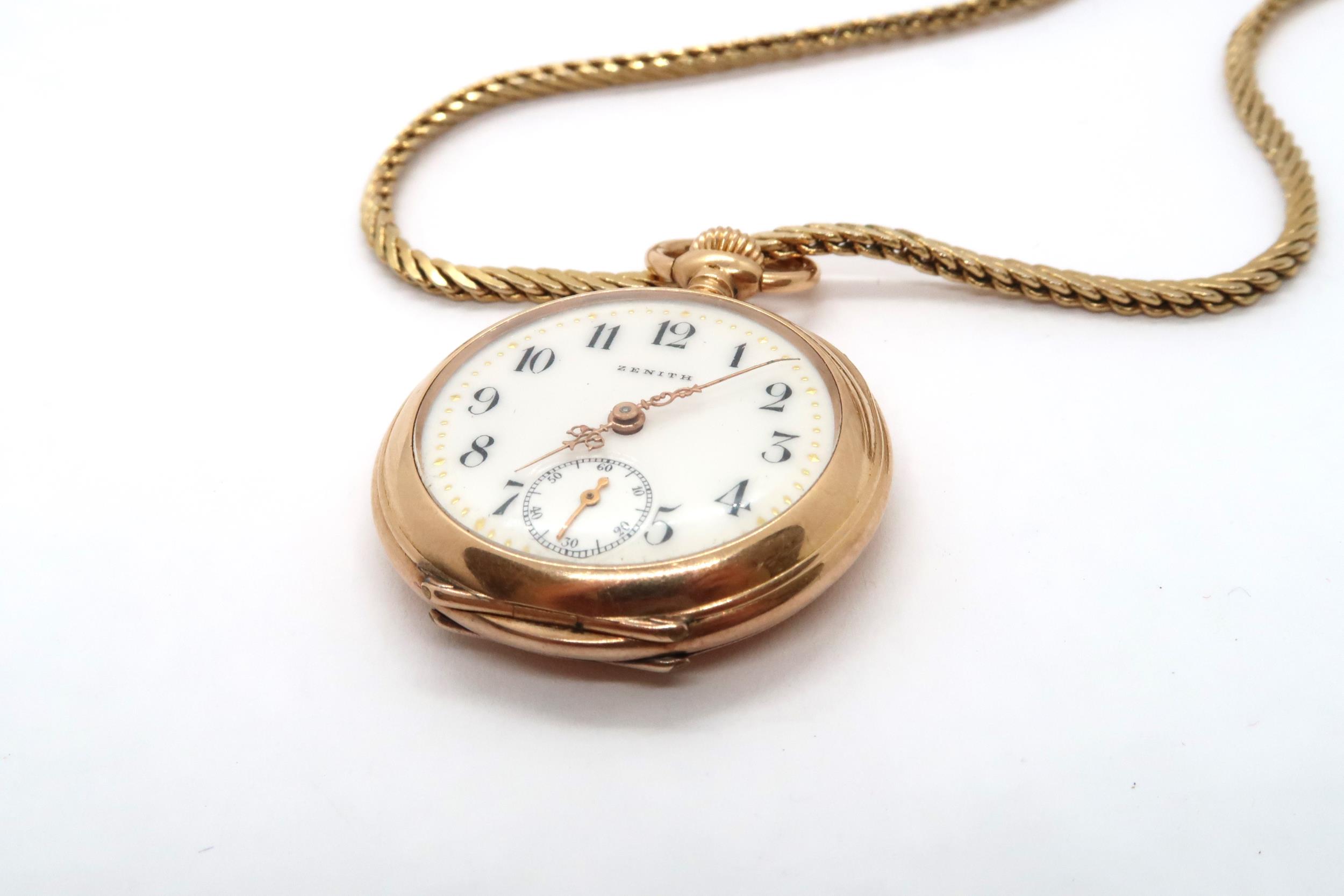 An 18ct yellow gold Zenith pocket watch on yellow metal chain - approx. weight 21.2 grams