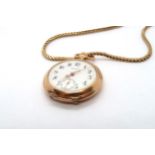 An 18ct yellow gold Zenith pocket watch on yellow metal chain - approx. weight 21.2 grams