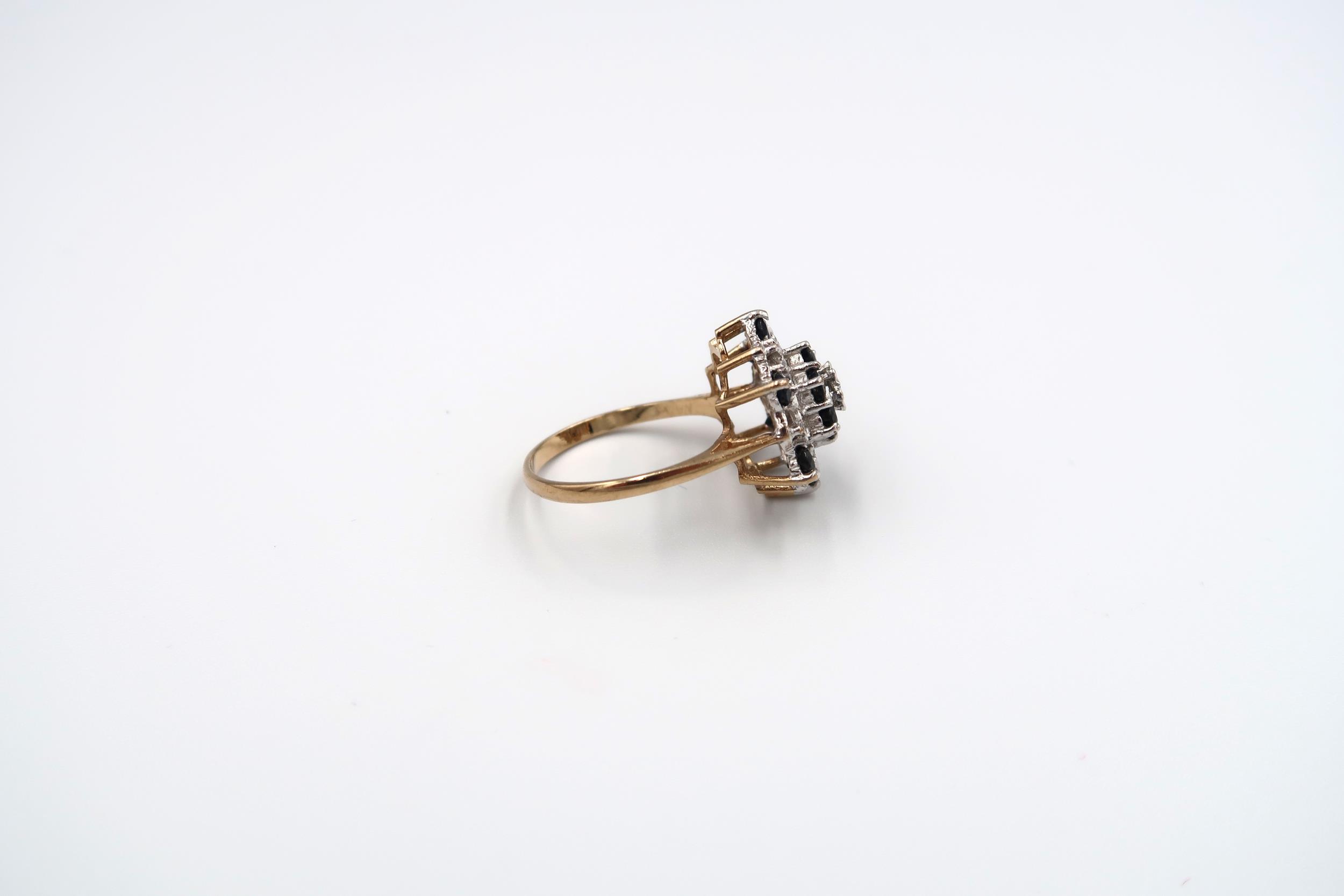Two 9ct gold rings. To include a sapphire and diamond cluster ring and a paste set marquise shape - Image 5 of 6