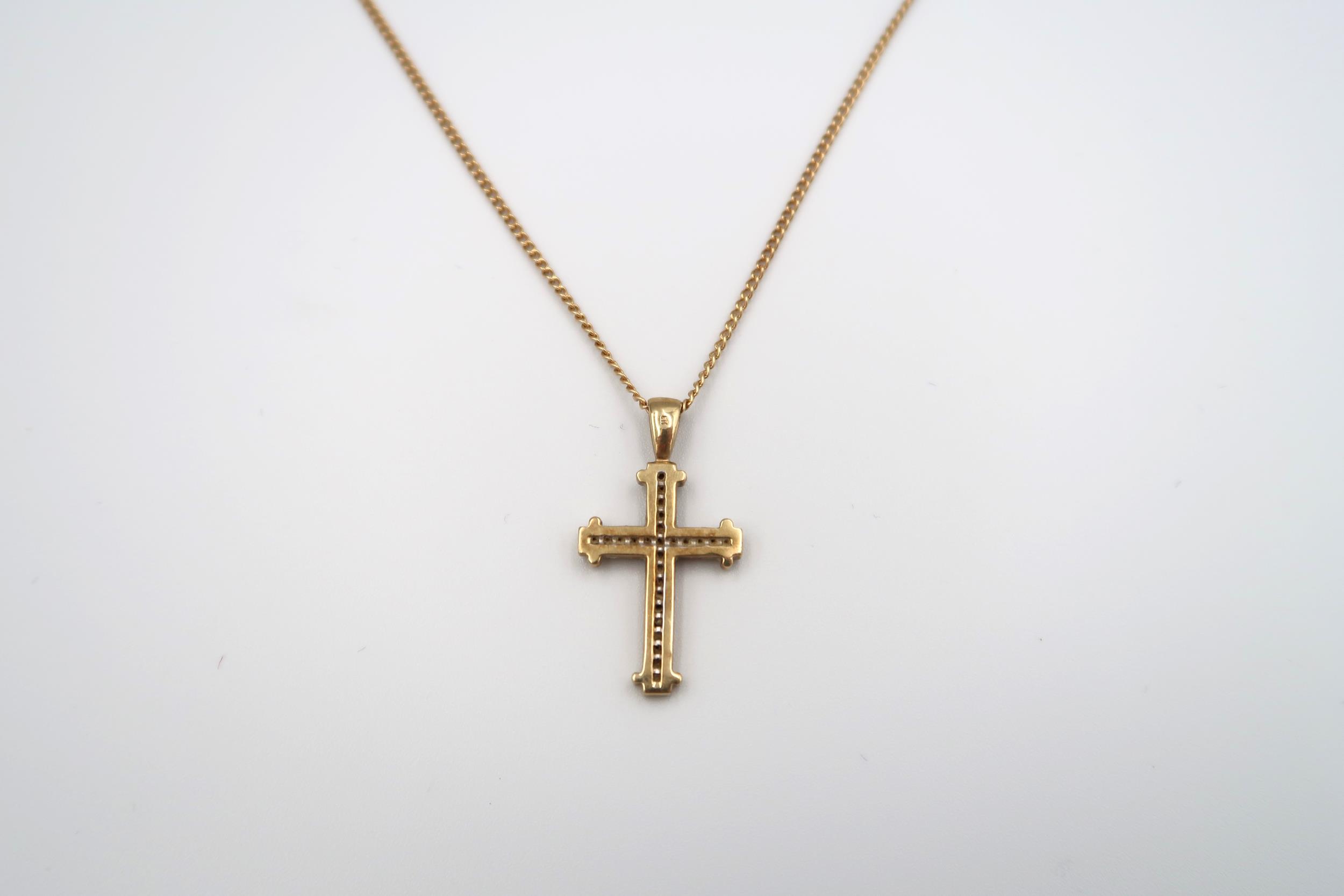 A 9ct yellow gold crucifix with 26 small cut diamonds on a 9ct gold chain, approx 5 grams - Image 3 of 4