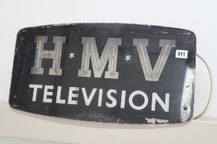 An H.M.V. television advertising board, illuminated, 53cm wide x 29cm high x 7cm deep