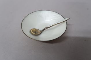 A David Anderson (Norwegian) Silver gilt and enamel salt with spoon, decorated with white enamel