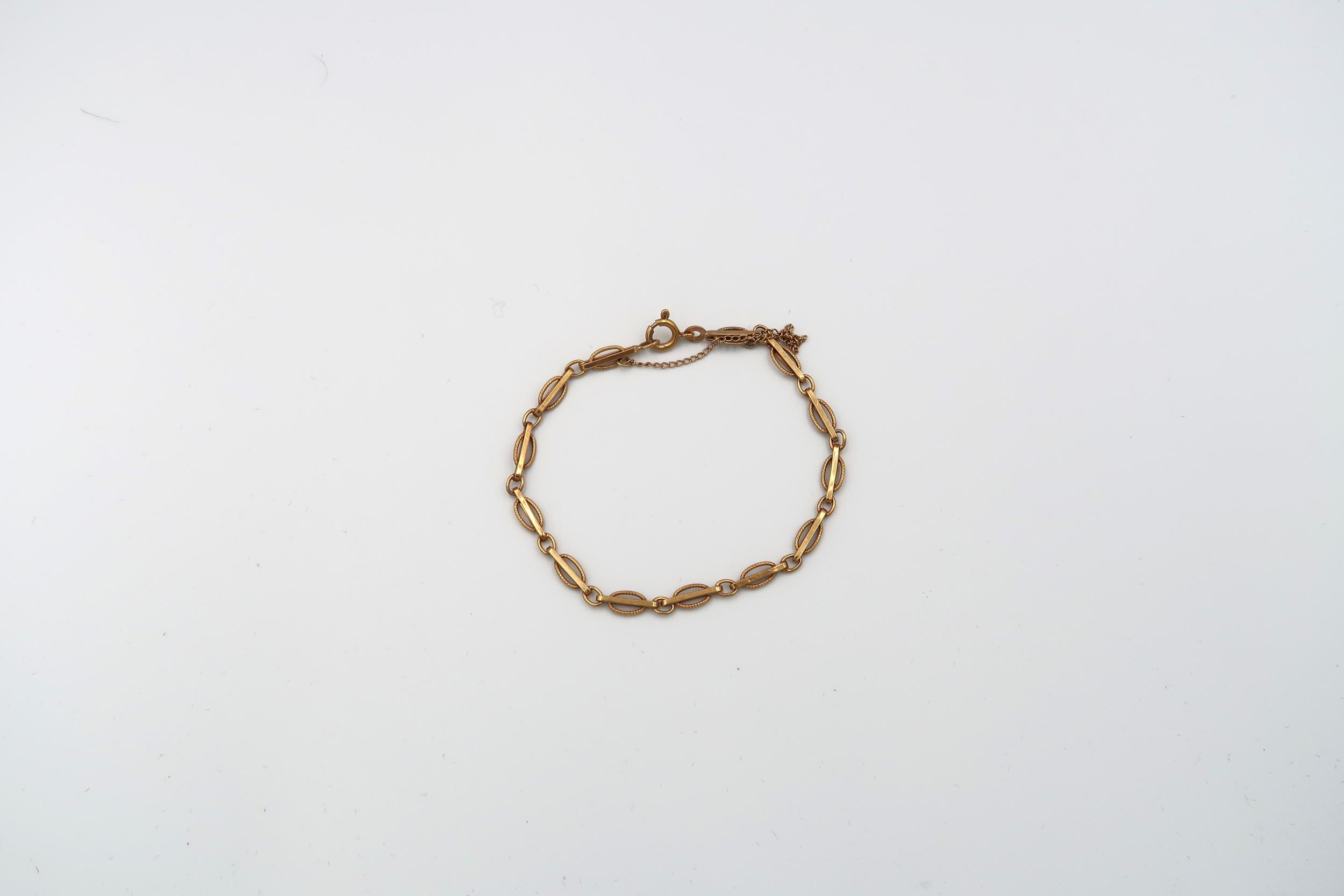 Four 9ct gold necklaces and a bracelet, total weight 15 grams - Image 5 of 5