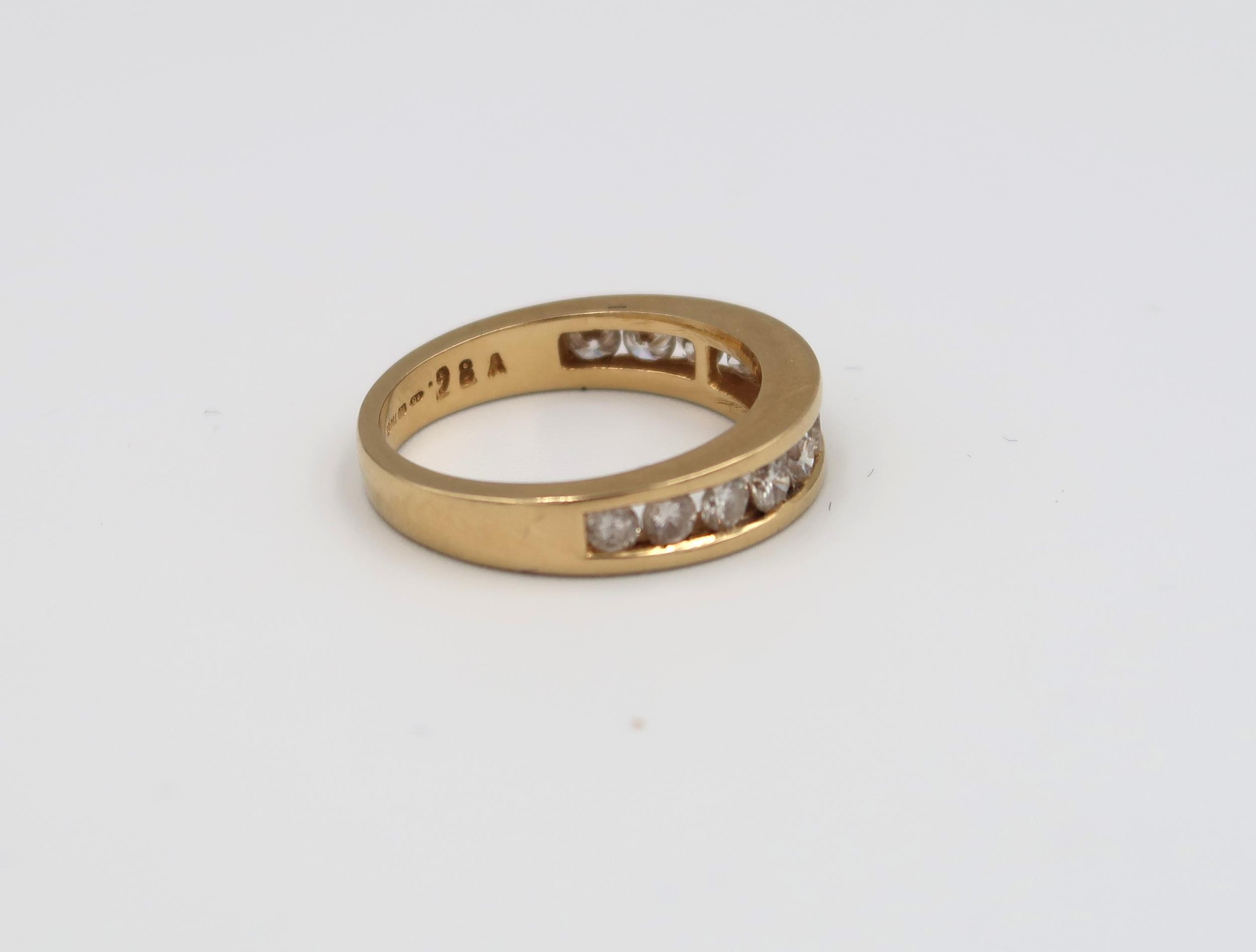 A hallmarked 18ct yellow gold diamond half eternity ring, 12 round brilliant cut diamonds with - Image 2 of 3