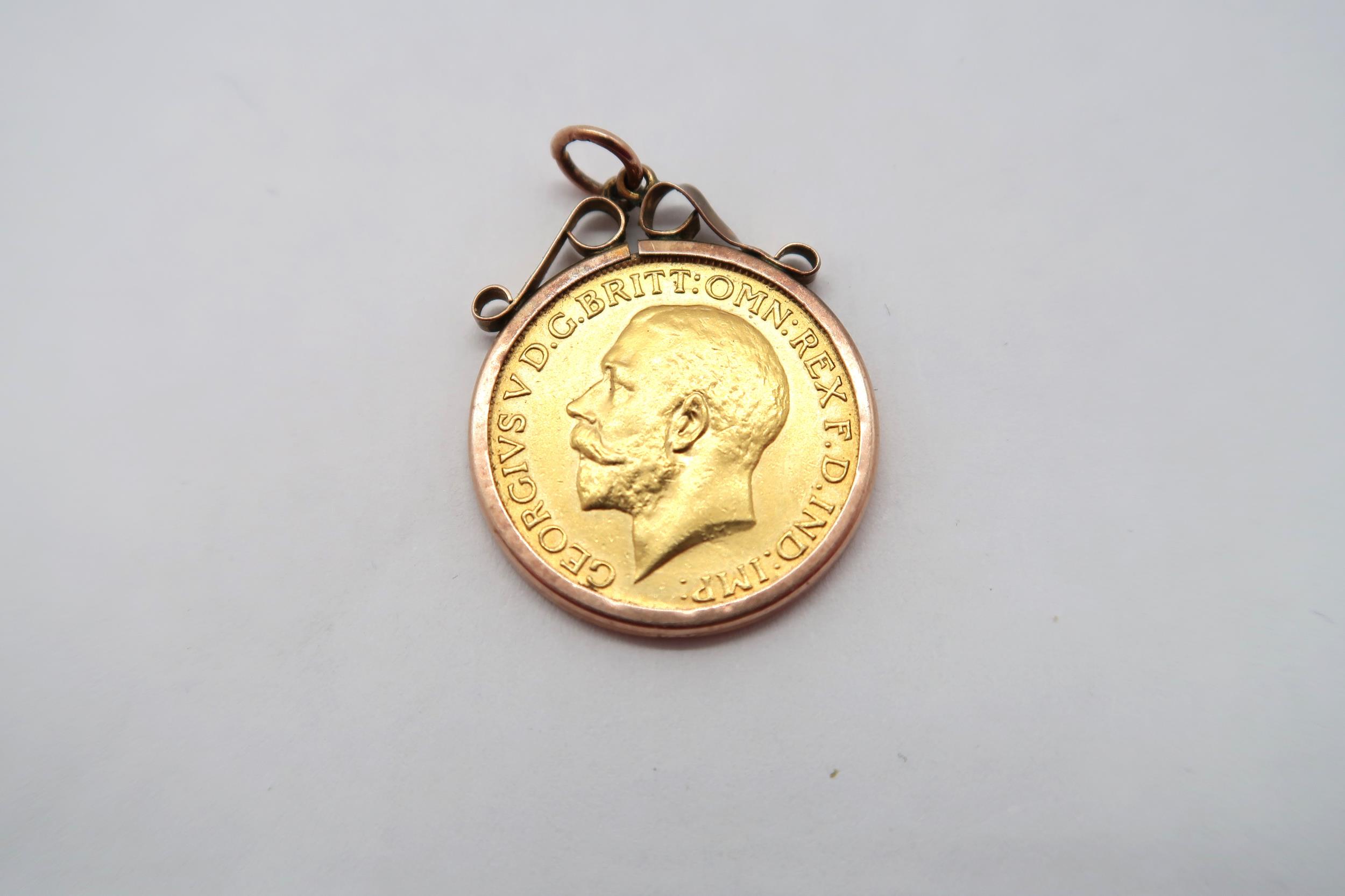 A sovereign date 1918 in a gold mount - total weight approx 9 grams - Image 2 of 2