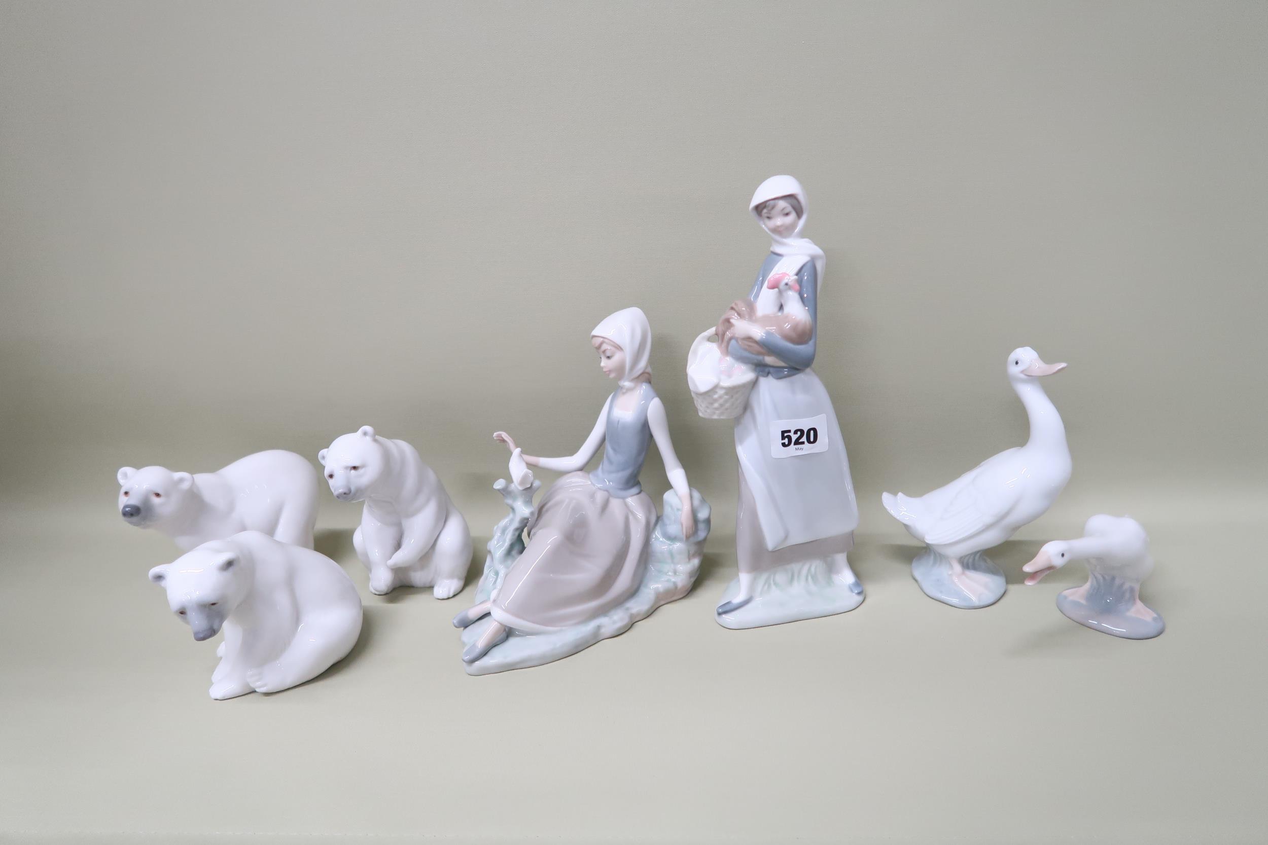 Six Lladro figures including Polar Bears (3), Goose and seated Lady with Bird, one Nao Goose