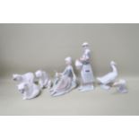 Six Lladro figures including Polar Bears (3), Goose and seated Lady with Bird, one Nao Goose