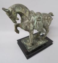 A bronze horse on stand - 27cm