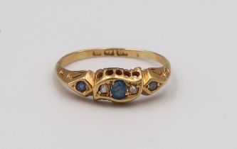 An 18ct diamond and sapphire dress ring, approx 2 grams