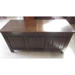 A 20th century oak three panel linen fold coffer/blanket box - Width 114cm x Height 54cm x Depth