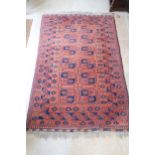 A vintage Afghan rug, 195cm x 127cm