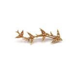 A marked .625ct yellow gold bar brooch, four swallows all with seed pearls, approx 4.6 grams