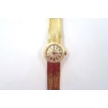 A ladies Omega wristwatch with an 18ct gold strap - approx weight 37.9 grams