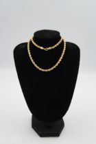 Four 9ct gold necklaces and a bracelet, total weight 15 grams
