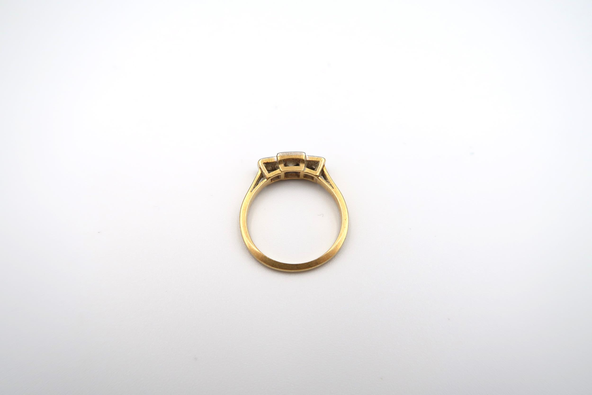 A brilliant cut diamond three stone ring. Estimated total diamond weight 0.50ct. Estimated H/I - Image 3 of 3