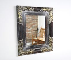 A decorative modern mirror - 59cm x 49cm