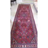 A handmade Meimah rug - 3.98cm x 1.85cm