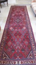 A handmade Meimah rug - 3.98cm x 1.85cm