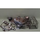 A quantity of silver plated items including toast racks, flatware etc.