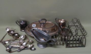 A quantity of silver plated items including toast racks, flatware etc.
