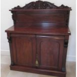 A good quality flame mahogany chiffonier with two drawers over two cupboard doors with a good patina