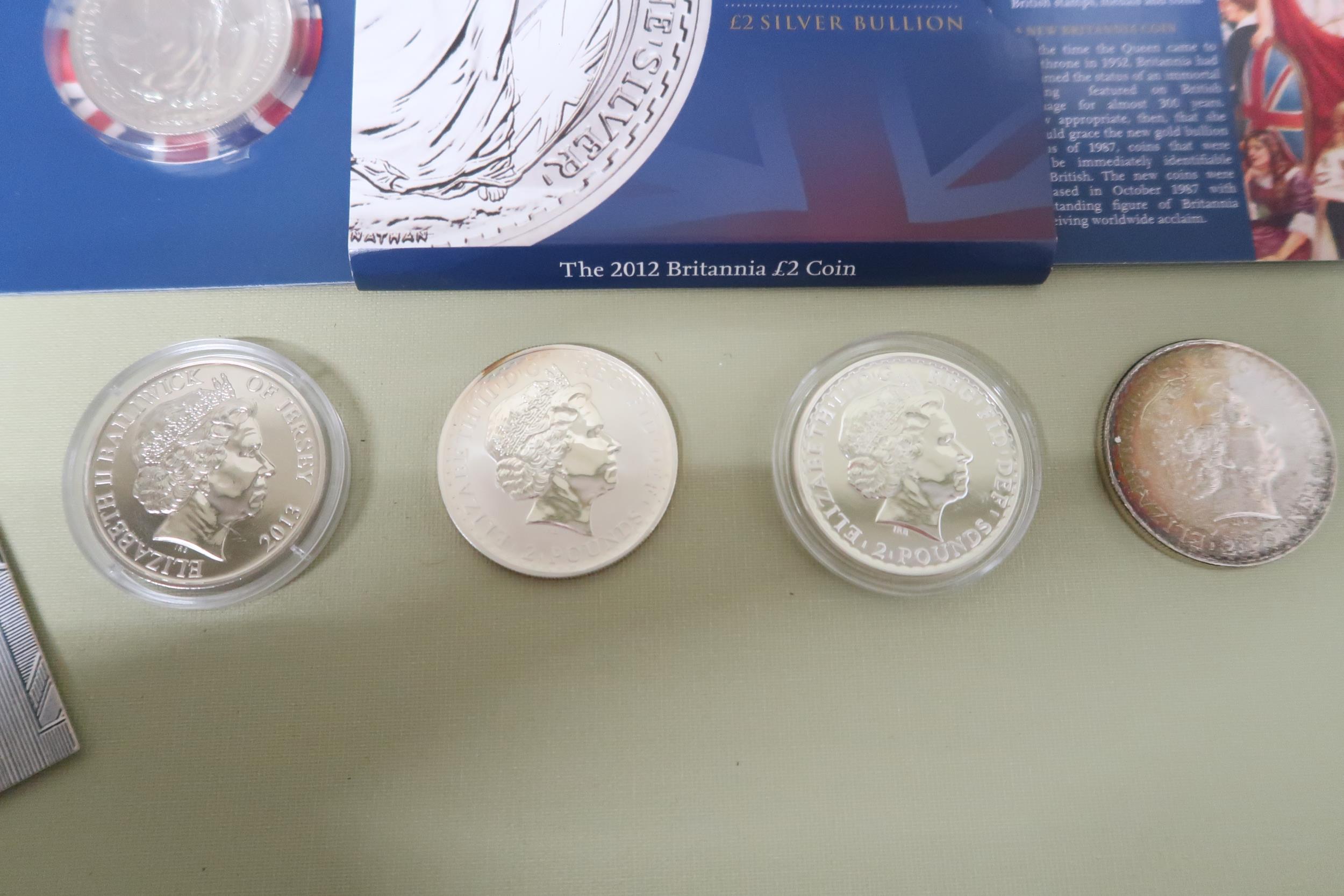 Seven pure silver proof coins and a Britannia two pound sterling silver bullion coin and a ten pound - Image 3 of 4