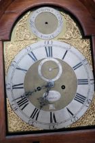 An 8 day Grandfather clock with a brass dial with a plaque for Hanson London, in an oak case with