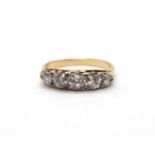 A ladies 18ct yellow gold ring set with five old cut diamonds - ring size P - estimated total