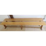 A pair of oak benches - Length 280cm x Height 47cm - removed from a local private school dining hall