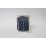 A hallmarked Sterling Silver photo frame - Frame size 8cm x 10.5cm - photo size 9cm x 6cm
