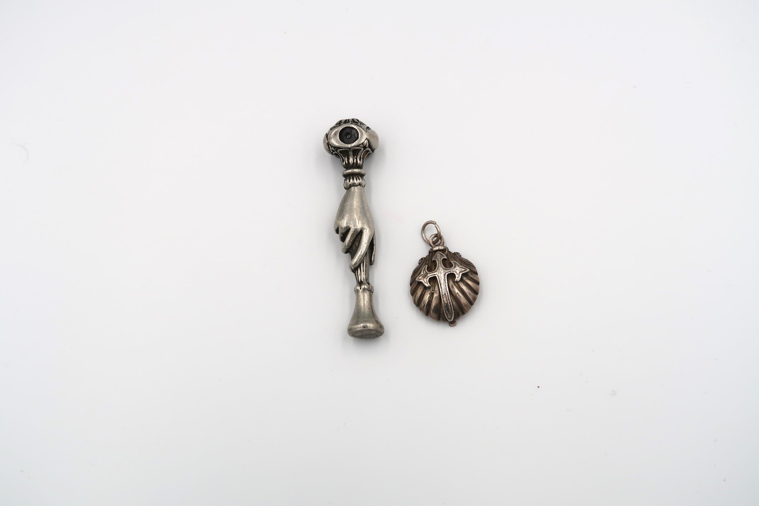 A silver ingot pendant on chain, circular silver pendant and a pewter pipe tamper - Image 2 of 2