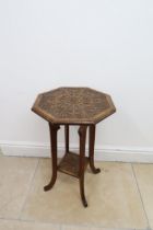 A circa 1900's carved oak two tier lamp table/jardiniere stand - Height 65cm