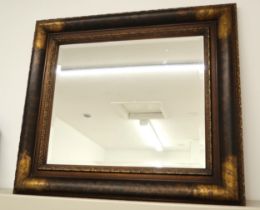 A modern mirror with bevelled edged glass - 84cm x 74cm