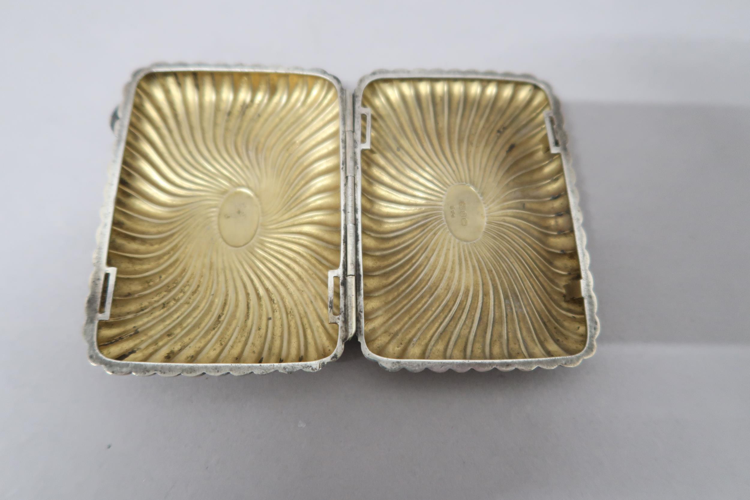 A silver cigarette case with ribbed decoration, approx 2.6 troy oz - Image 2 of 2