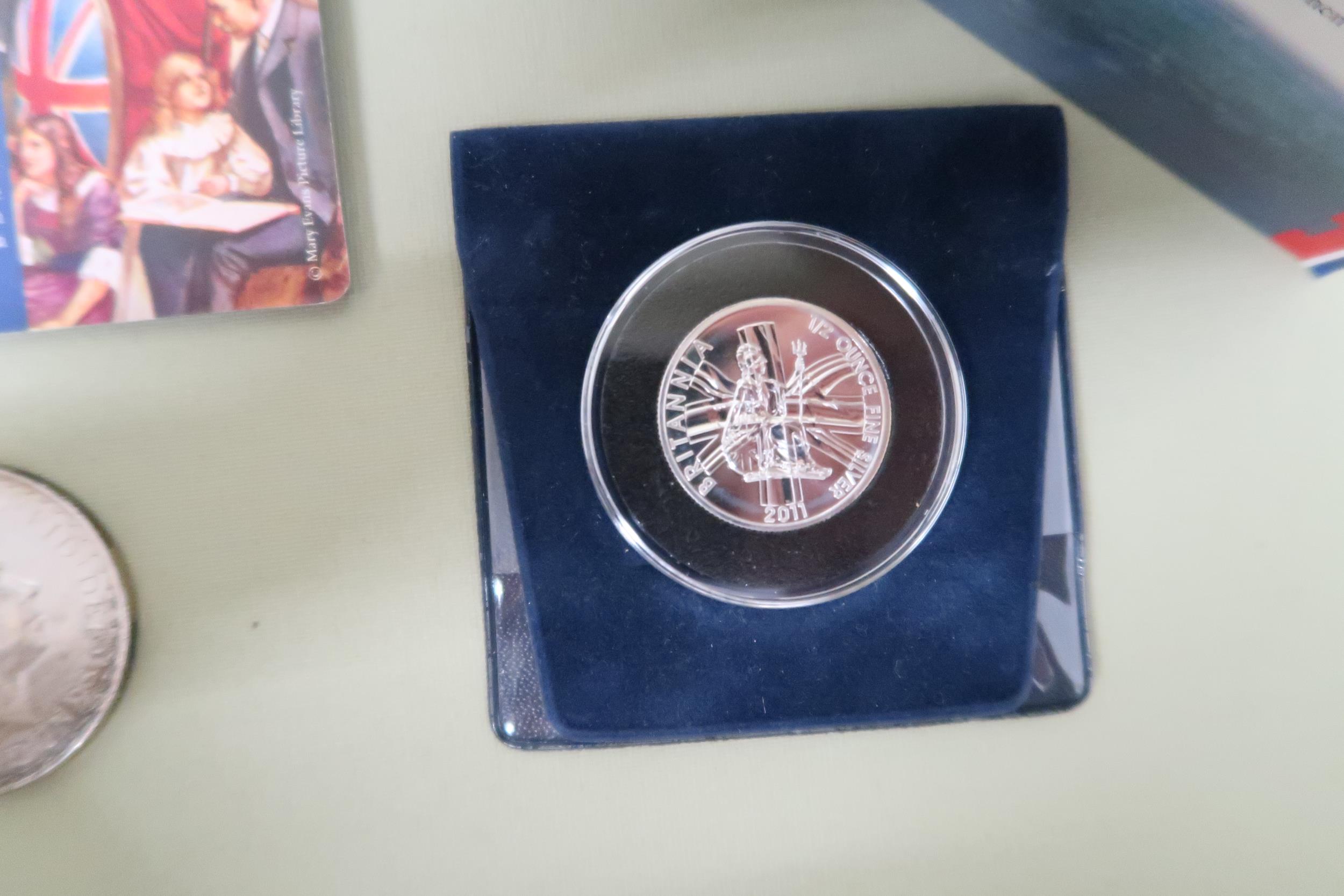 Seven pure silver proof coins and a Britannia two pound sterling silver bullion coin and a ten pound - Image 4 of 4