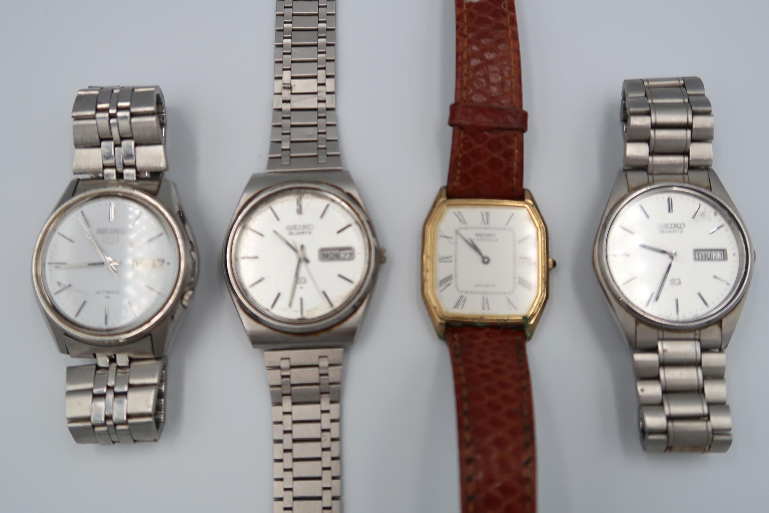 Four Seiko watches