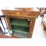 A Regency Rosewood and Tulip-wood Bookcase or Display cabinet with Brass Lion paw feet. 83 cm wide x