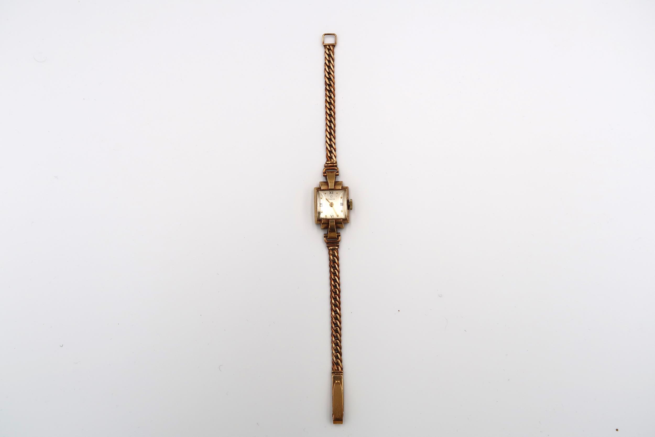 An Omega cocktail watch. Stamped 9ct. Weight 19.94 grams. Condition: good to fair in keeping with